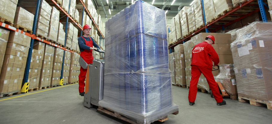 loading pallets in Wings Transport warehouse, Silverwing Industrial Estate, Croydon